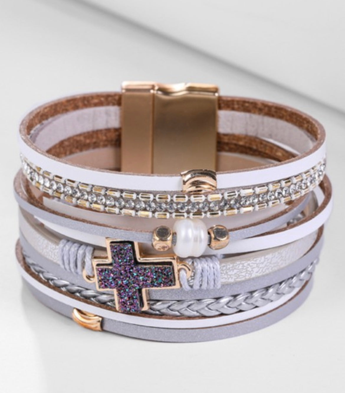 Multi strand leather bracelet with cross accent